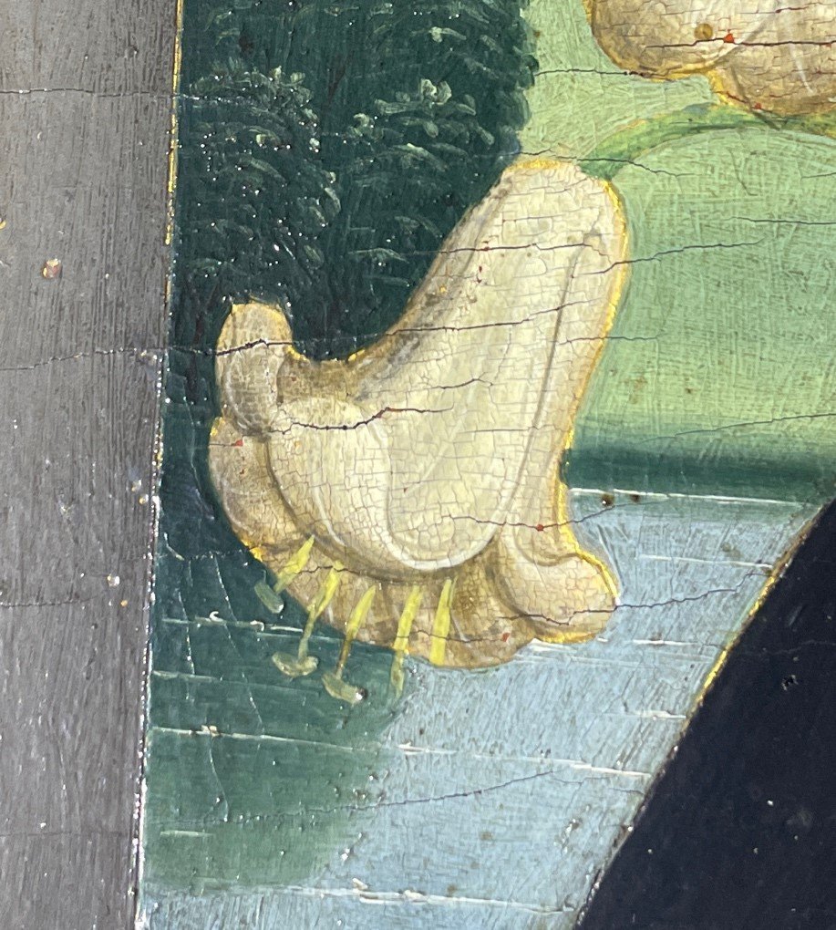 Detail of altarpiece with lily painted by Guido di Pietro, called Fra Angelico; stamen extensions, lake background and shore painted by Lorenzo di Credi. ca. 1420/ca. 1501. San Domenico, Fiesole, Italy. Photograph by Annika Finne