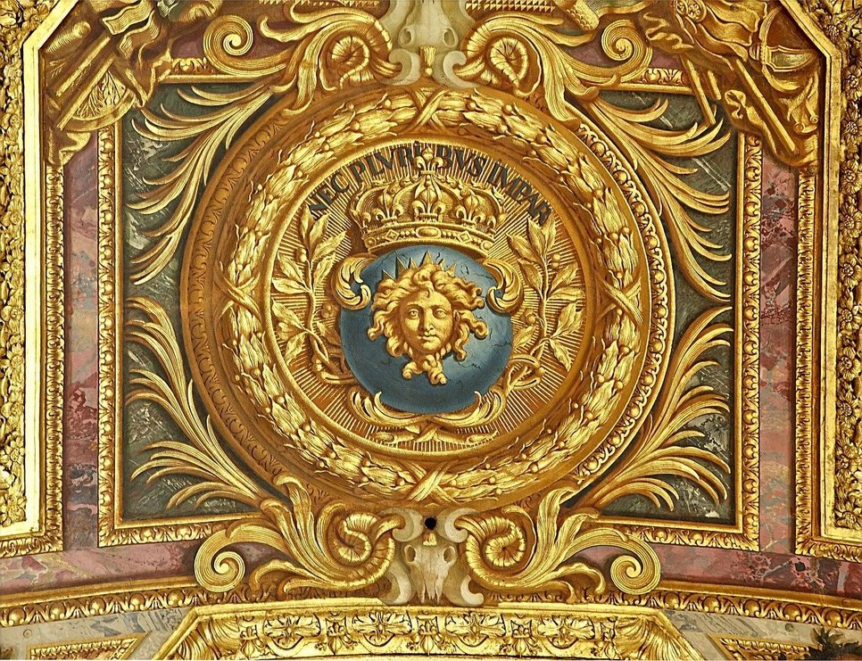 Charles Le Brun, Symbol of Louis XIV and his motto (ca. 1678-1684). Ceiling of the Hall of Mirrors in the Palace of Versailles, France. Source: https://commons.wikimedia.org/wiki/File:Nec_pluribus_impar_ceiling_galerie_des_glaces_versailles.jpg